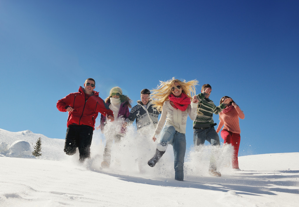 A group of friends having fun on the snow